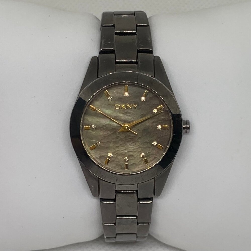 DKNY women wrist watch quartz analog black tone MOP dial all stainless running